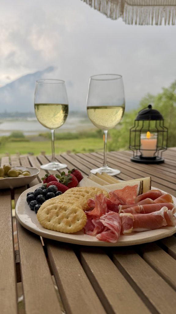 Romantic Lake Atitlán Airbnb terrace with wine charcuterie and volcano views at Orilla Casas en Ati Santiago Atitlán
