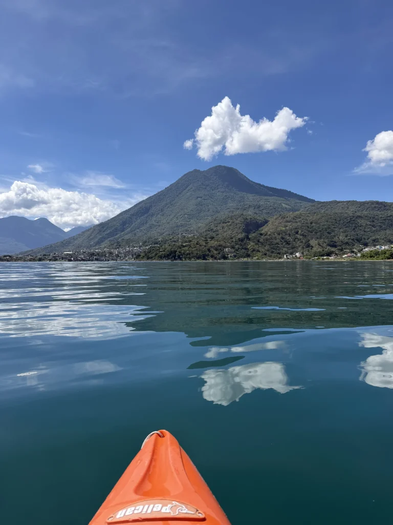 Kayaking from Principito's Universe near San Juan La Laguna toward Playa Las Cristalinas on Lake Atitlán