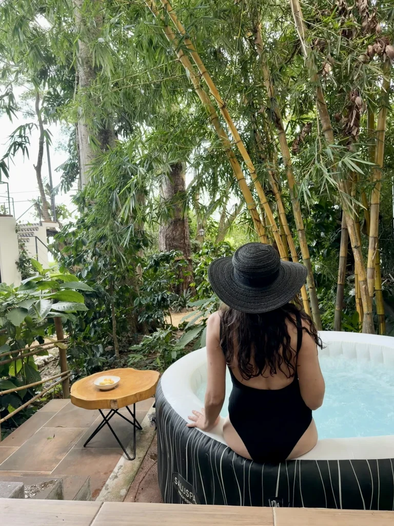 Private jacuzzi surrounded by tropical gardens at Las Baobas Principito's Universe near San Juan La Laguna Lake Atitlán