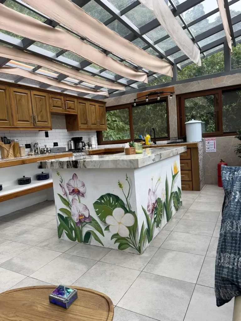Hand painted kitchen inside the Guatemala Dreams Tree House vacation rental in San Lucas Tolimán