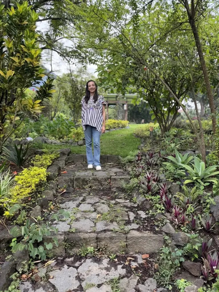 Walking through the lush gardens at Hotel Tolimán in San Lucas Tolimán